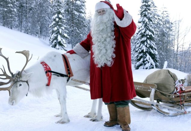 Papai Noel com sua rena